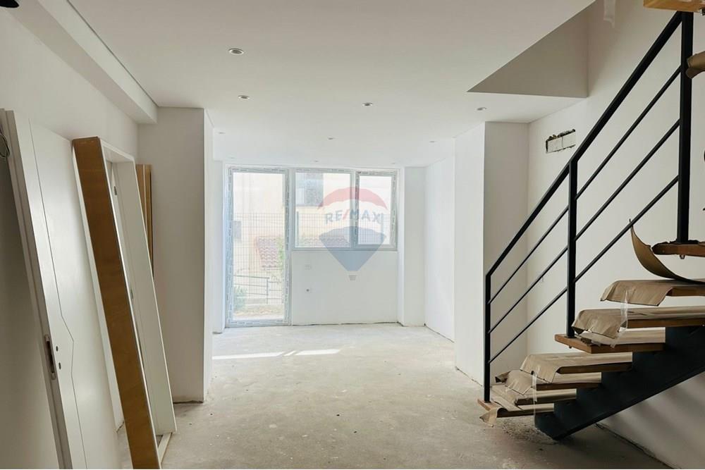 Duplex for sale with private yard high quality construction in well-managed building