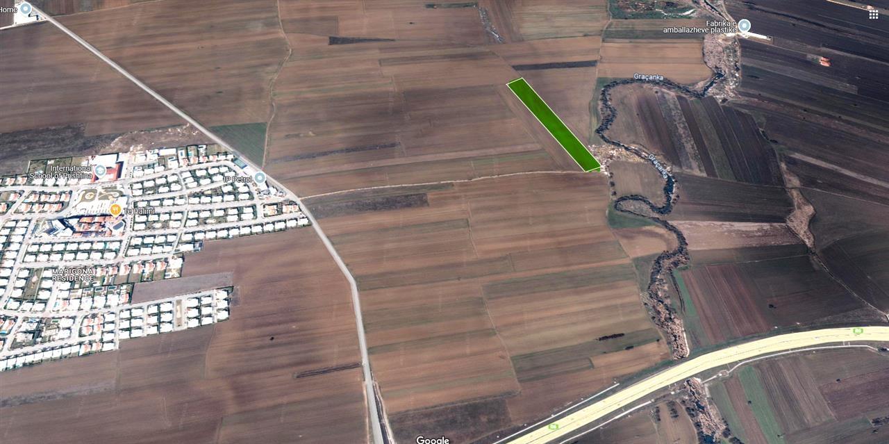 Shiten 1 hektarë 25 ari tokë përballë marigona residence