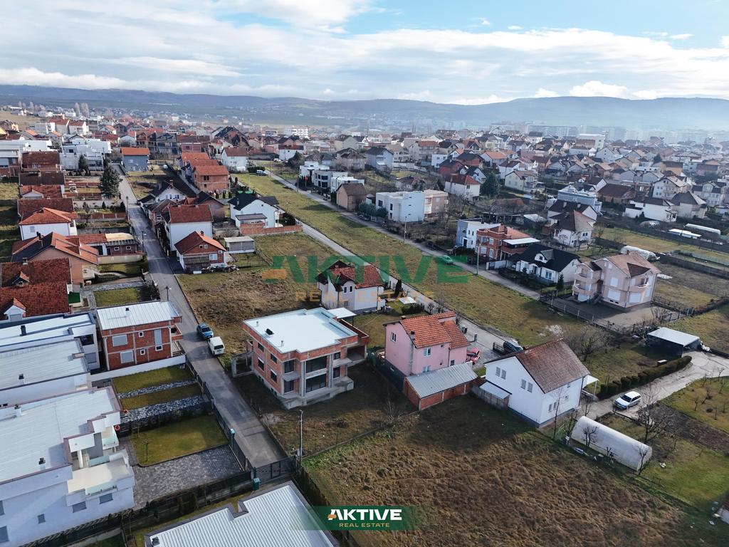 Casa en dheu i bardhë