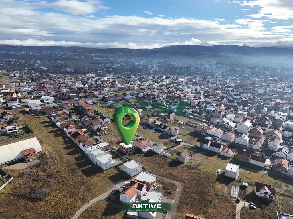 Casa en dheu i bardhë