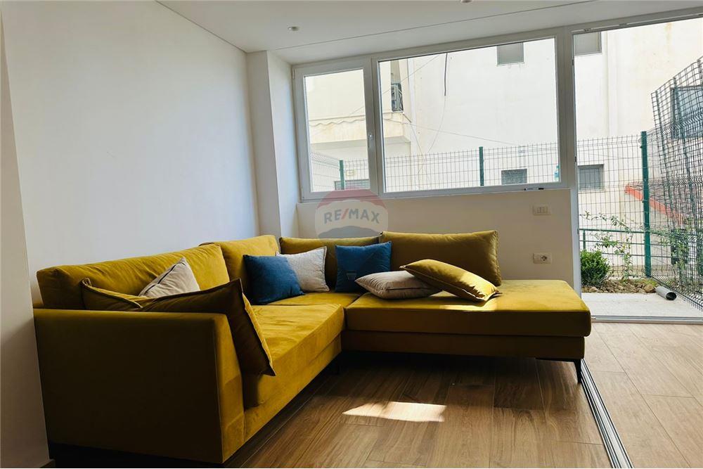 Duplex for sale with private yard high-quality construction in well-managed building